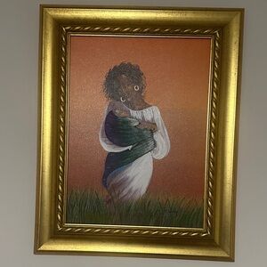 Gold Framed Art with Orange and Green Accents